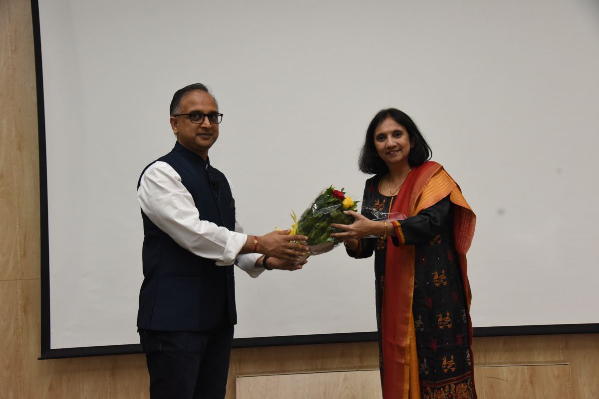 Kamlesh Jain being felicitated after a session